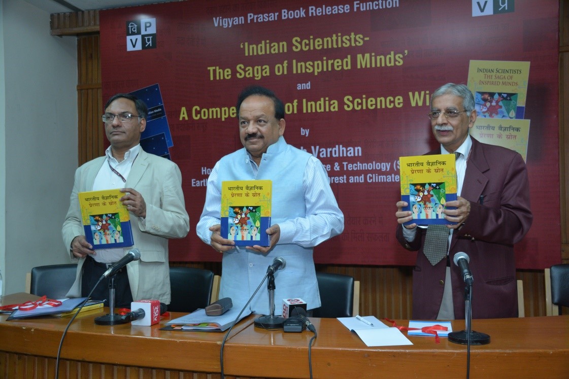 Prof. Ashutosh Sharma, Dr. Harshvardhan and Shri Chandermohan releasing the book