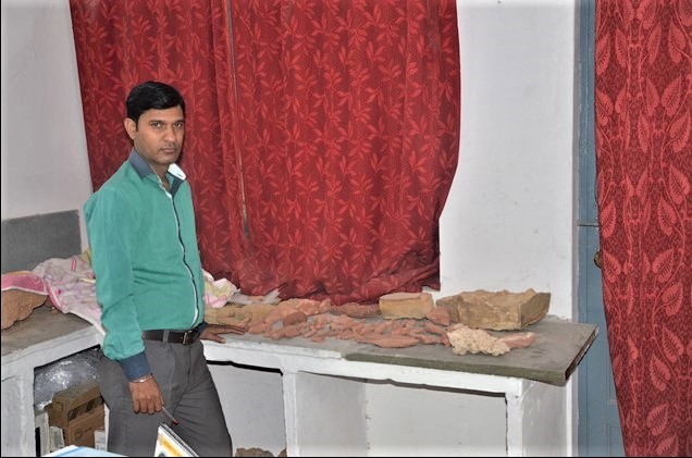 Dr. V. S. Parihar with specimen of trace fossils in laboratory