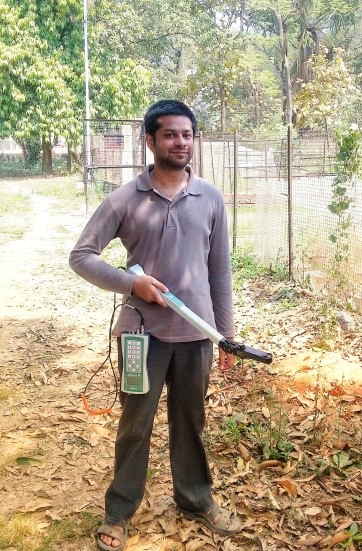 Arideep Mukherjee working in the field with canopy analyzer