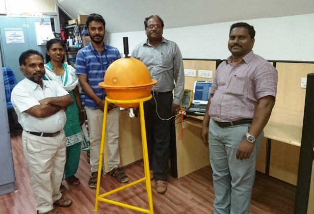 Members of research team with Drifting buoy