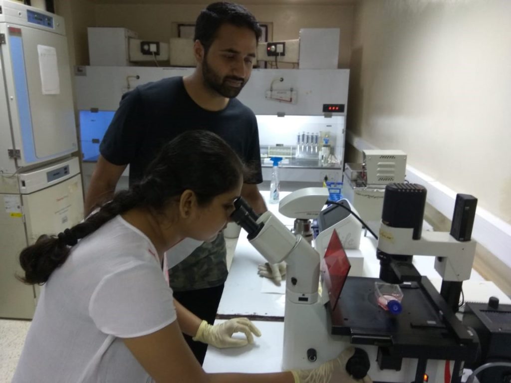 Team member Sriparna Mukherjee, and Irshad Akbar engaged in research work.
