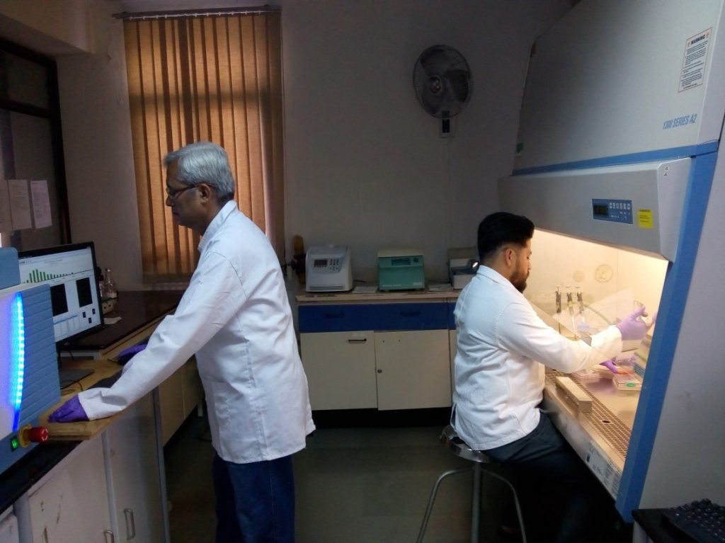 Dr. Dheeman Sarkar and Dr. S. Chakrabarty working in the lab