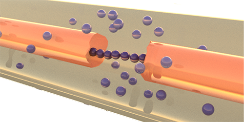 Figure representing broken circuit and copper microspheres bridging the gap (PRA)